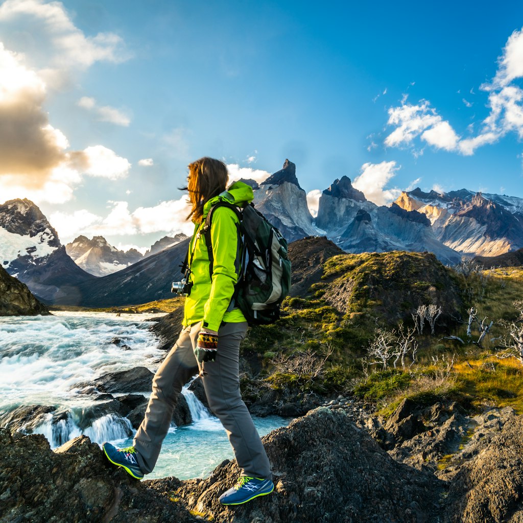 Female hiker walking on rocky ground near Salto Grande Waterfall with Los Kuernos Peak in the background.
1397527424
adventure, america, andes, backpack, beautiful, beauty, camping, chile, dream, explore, extreme, forest, freedom, gravel, hike, hiking, holiday, journey, kuernos, lake, landscape, majestic, mountain, national, nature, outdoor, outdoors, paine, park, patagonia, peak, peaks, pehoe, people, salto grande, scenic, south america, sport, storm, summer, sun, top, torres, tourism, tourist, travel, trek, trekking, water fall, waterfall
