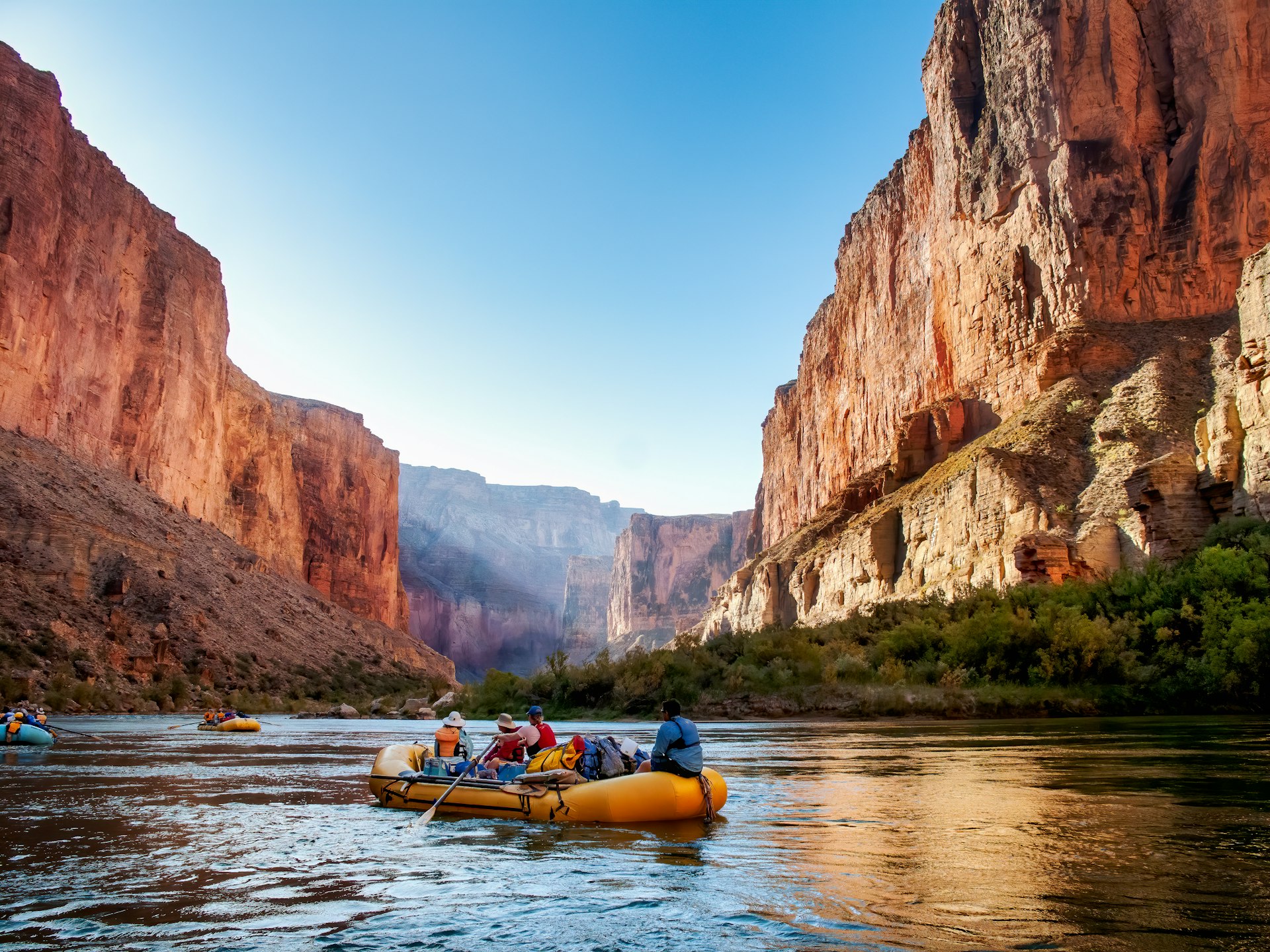Rafting at sunrise on the Colorado River in the Grand Canyon, Arizona, USA