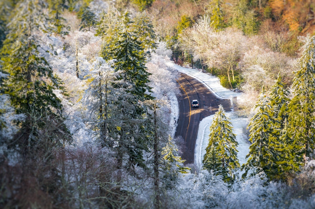 Car transversing  Newfound Gap, US 441 during winter time in the Great Smoky Mountains National Park in Tennessee; Shutterstock ID 137066594; your: Claire Naylor; gl: 65050; netsuite: Online Ed; full: Great Smokey Mountains NP road trips
137066594