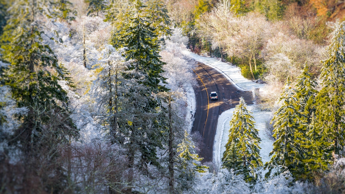 Car transversing  Newfound Gap, US 441 during winter time in the Great Smoky Mountains National Park in Tennessee; Shutterstock ID 137066594; your: Claire Naylor; gl: 65050; netsuite: Online Ed; full: Great Smokey Mountains NP road trips
137066594