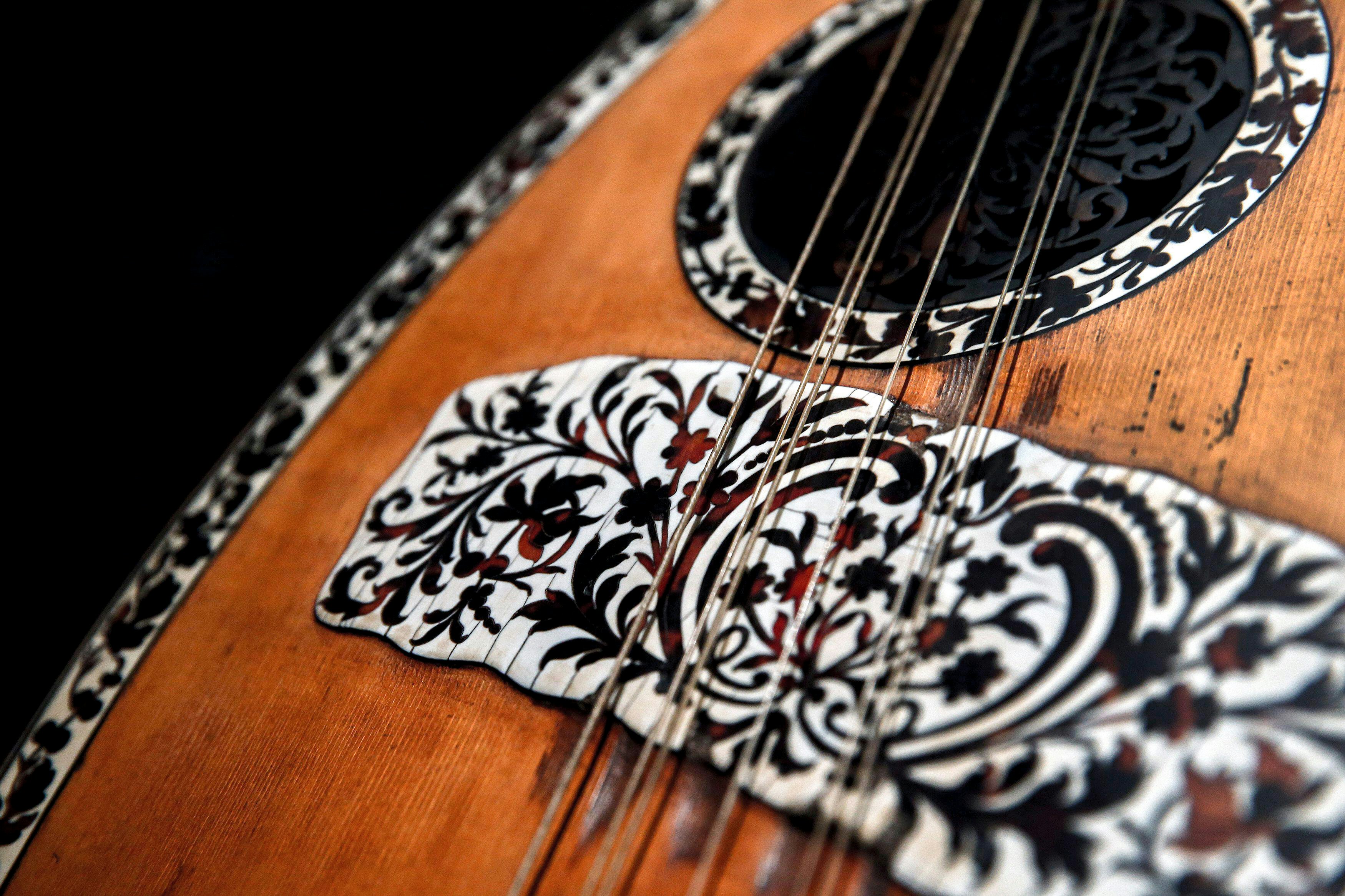 2E6AXR9 Detail of a 19th century laghouto, or lute, inlaid with ivory and tortoise shell, displayed at the Museum of Greek Folk Musical Instruments (MELMOKE) in Athens February 15, 2015. Tucked away in a corner of Athens' historic Plaka district is the small MELMOKE where visitors are treated to rows of wood and bone flutes, pottery drums called toumbeleki, and gaida - bagpipes made of sheep or goat skins. The laghouto is said to have been made by luthier Manolis Venios of Constantinople (present day Istanbul), a master craftsman whose works now sell for many thousands of dollars. Picture taken Februa
2E6AXR9
MUSIC, GREECE, MUSEUM