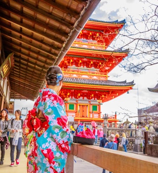 A woman wearing traditional Japanese clothing at Kiyomizu-dera Buddhist Temple.