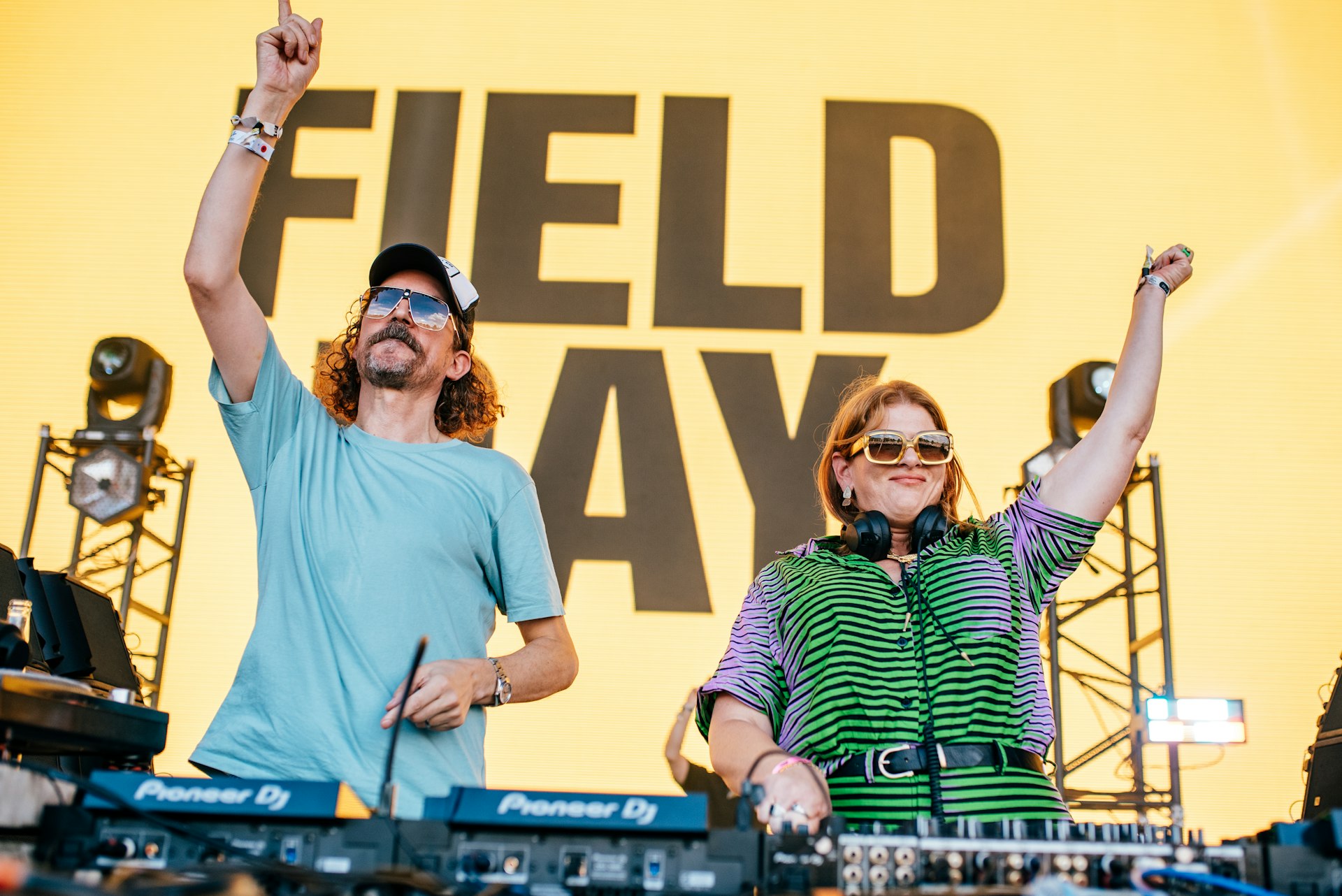 DJs in front of a Field Day / All Points East stage in a London summer music festival 