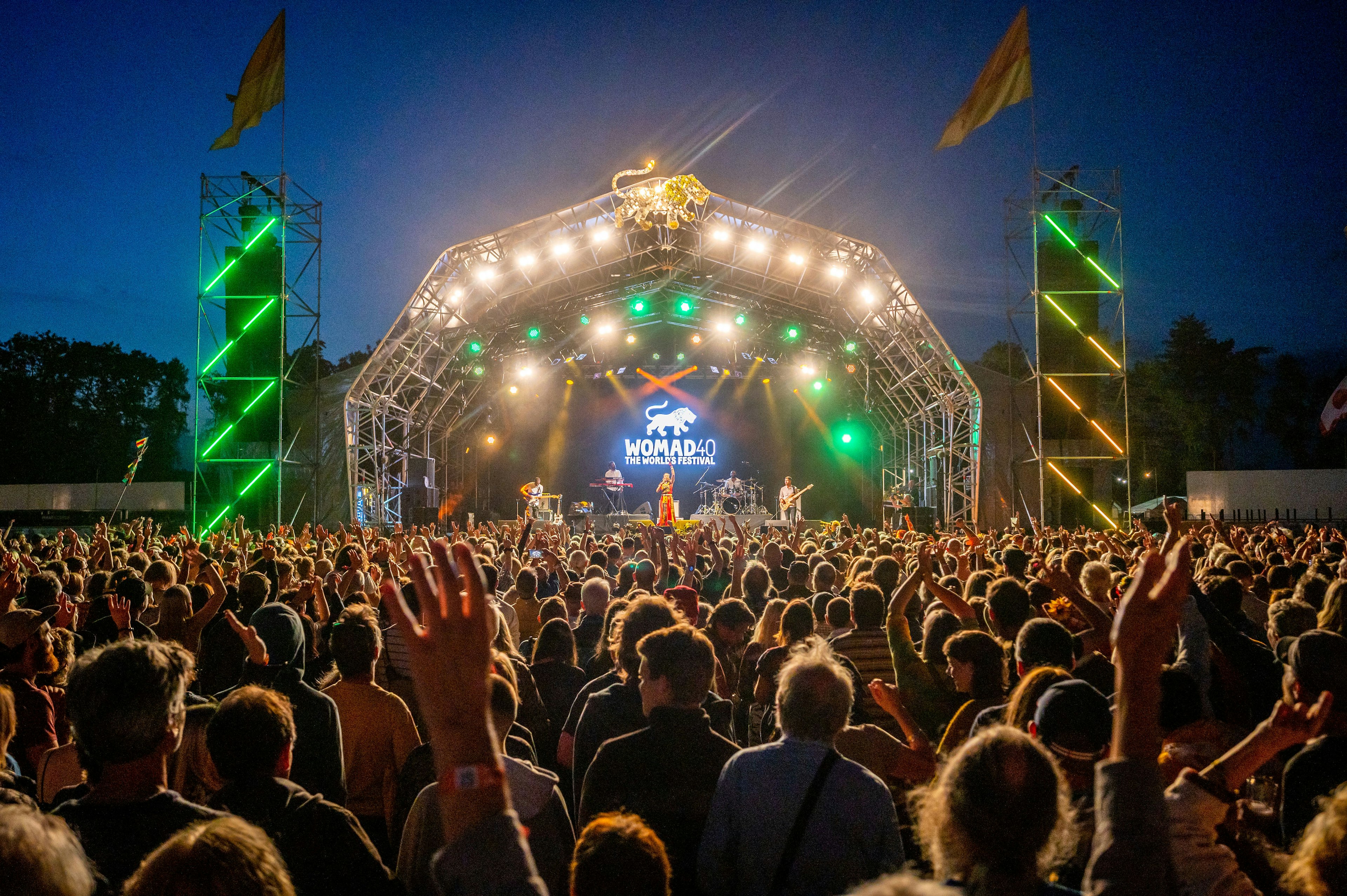 Yellow flags adorn the Womad site as the sun sets on its first day reigning in the 40th anniversary celebration.jpg