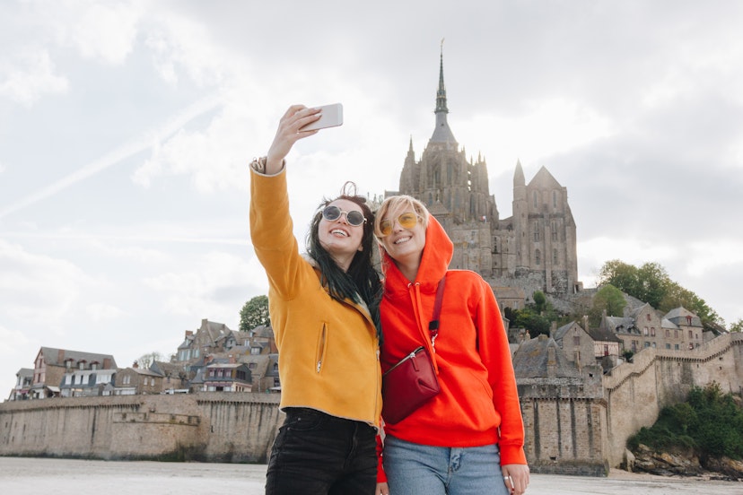 beautiful girls taking selfie on smartphone near Saint michaels mount, Normandy, France
1008393588
digital device, using, red hoodie, saint michaels mount