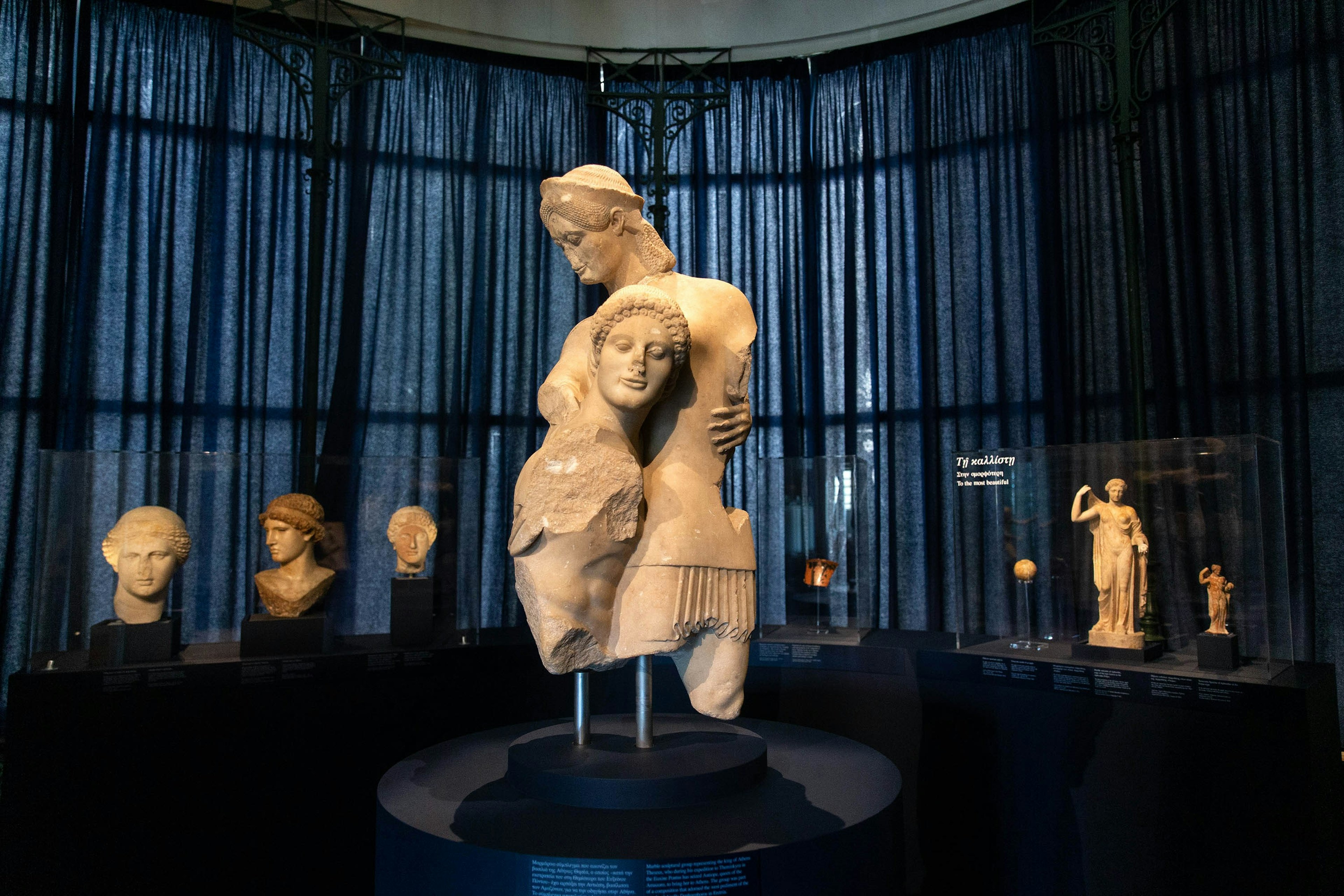 Sculptures are seen during a preview of the exhibition "Kallos, The Ultimate Beauty" at the Museum of Cycladic Art in Athens, Greece