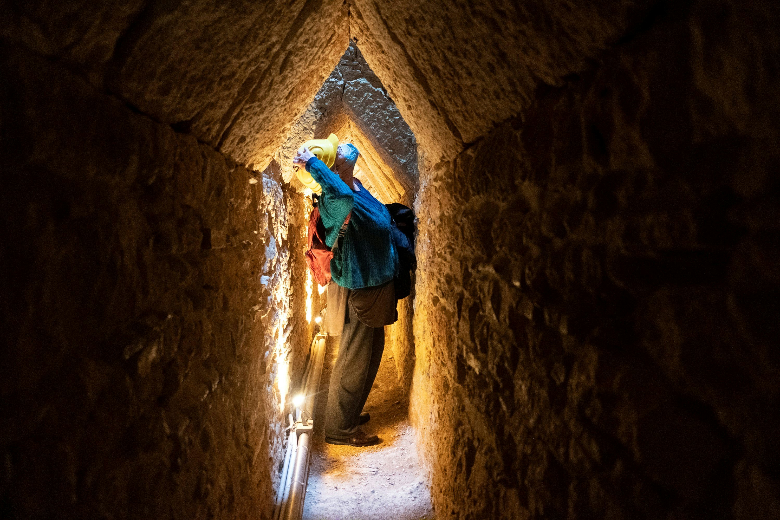 Photo taken on April 18, 2022 shows a visitor in the Tunnel of Eupalinos, which is situated in Samos, an island in the eastern Aegean, Greece. The Tunnel of Eupalinos is a water pipeline running through Mount Kastro in Samos, built in the 6th century BC to supply water to the ancient city of Samos. (Photo by Marios Lolos/Xinhua via Getty Images)
1240120216
wn