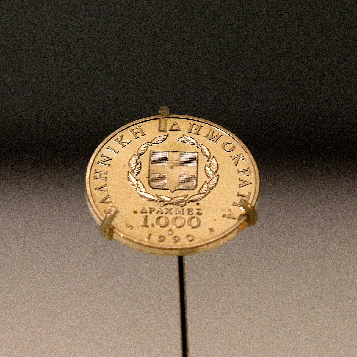 A Greek 1,000 drachma coin dating from 1999, sits on display in a secure cabinet at the Bank of Greece museum in Athens, Greece, on Tuesday, Feb. 14, 2012. European officials ratcheted up the pressure on the Greek government to deliver budget cuts in exchange for a second bailout as they insisted that default is not an option. Photographer: Simon Dawson/Bloomberg via Getty Images
138990488
AUSTERITY, BAILOUT, CURRECY; CURRENCIES, CUTS, ECONOMY, EMEA, EUROPE, FINANCE, FINANCIAL