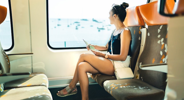 Train travel in summer. Young woman on rail trip in Europe. Railway passenger on journey to vacation destination. Girl looking out the window, sea view. Person sitting on subway bench alone.
1395175505
alone, departure, destination, european, female, girl, happy, holiday, interrail, itinerary, lady, lifestyle, metro, person, pretty, rail, railway, ride, sit, space, train, transport, trip, urban, vacation, view, woman, young
