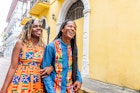 Cute, Fashionable Afro-Descendant Black Tourist Couple Walking Together on Date Night in the Street in Huerta Sandoval Neighborhood of Panama City, Panama
1426692018
A smiling couple walk arm in arm along the street in Panama City