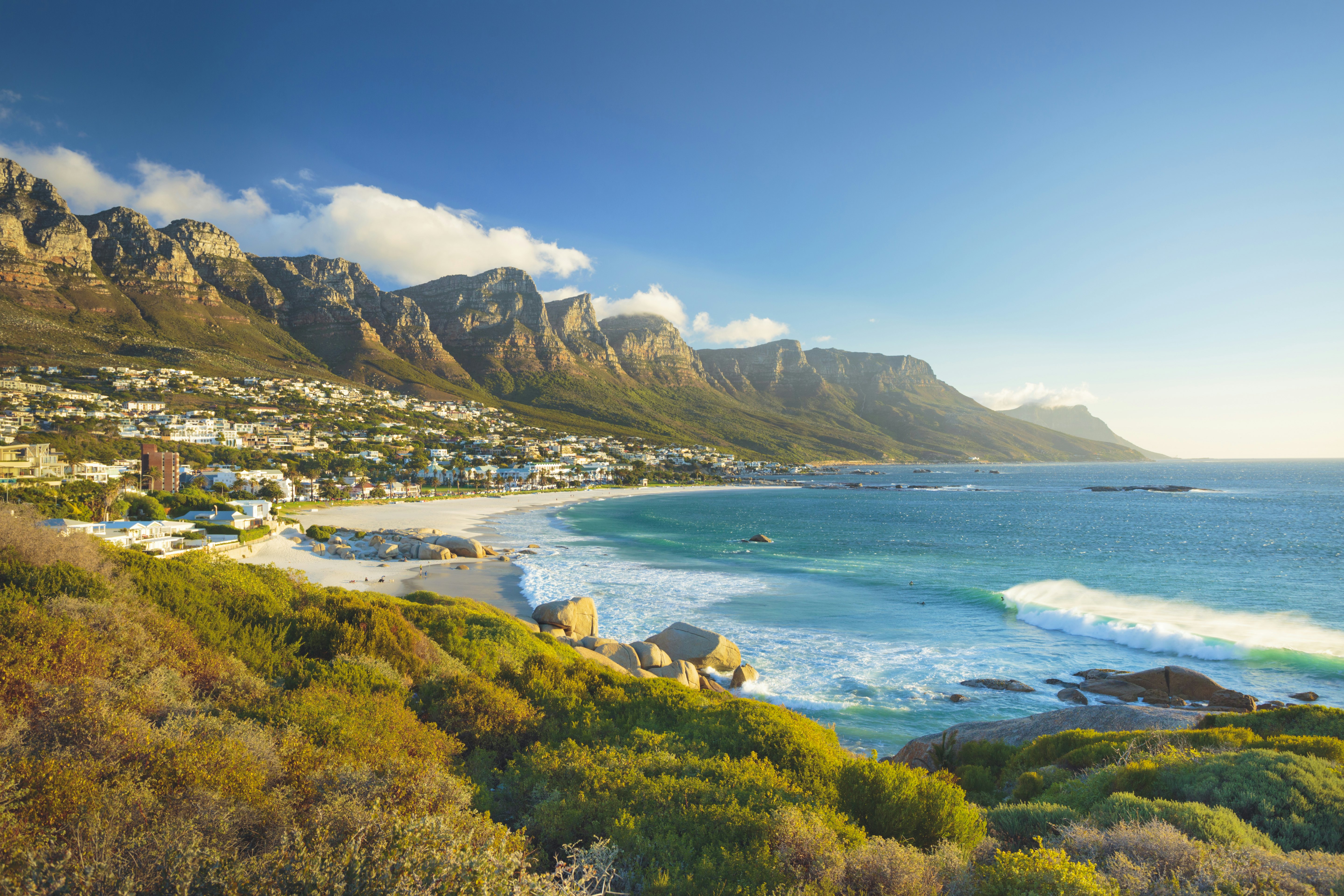 View of the beach and Twelve Apostles mountain in Camps Bay near Cape Town in South Africa.