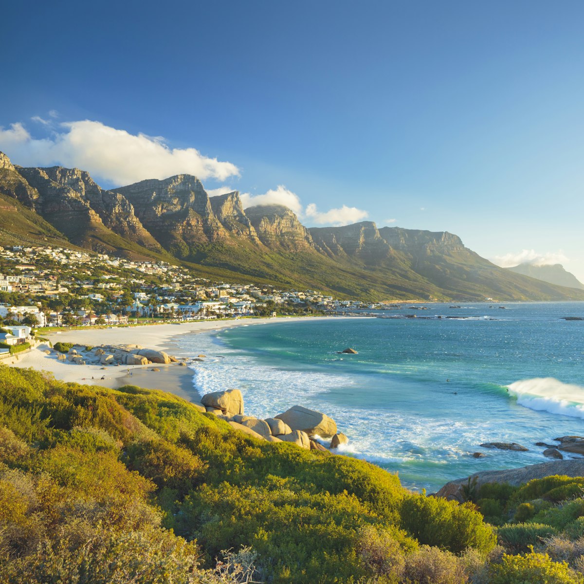 View of the beach and Twelve Apostles mountain in Camps Bay near Cape Town in South Africa.