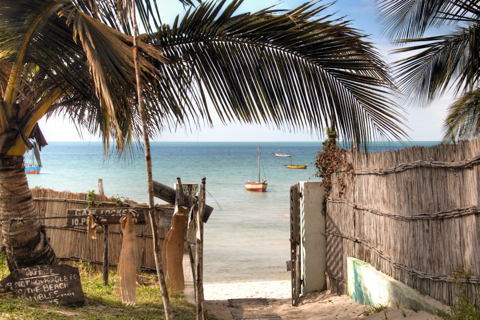 Gate of a guest house in Vilanculos, Mozambique, leading to the beach and the Indian Ocean.