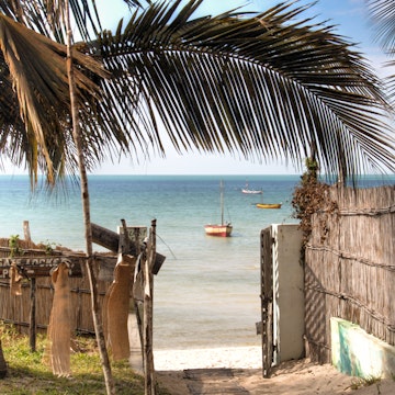 Gate of a guest house in Vilanculos, Mozambique, leading to the beach and the Indian Ocean.