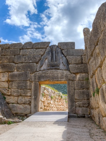 The Lion Gate was the main entrance of the Bronze Age citadel of Mycenae, southern Greece. It was erected during the 13th century BC in the northwest side of the acropolis and is named after the relief sculpture of two lionesses in a heraldic pose that stands above the entrance. The Lion Gate is the sole surviving monumental piece of Mycenaean sculpture, as well as the largest sculpture in the prehistoric Aegean.