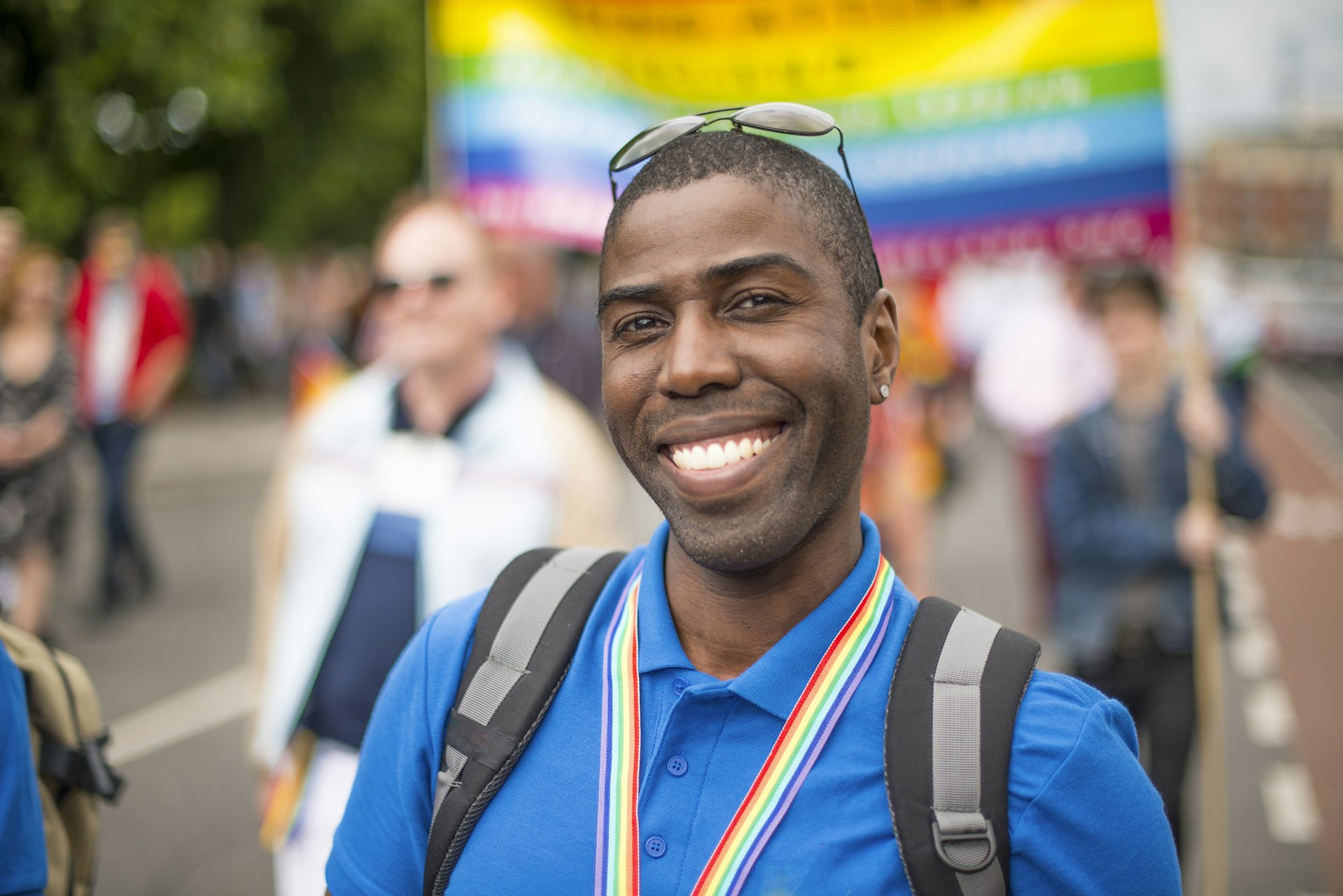 A man smiles at the Pride parade, Dublin Ireland