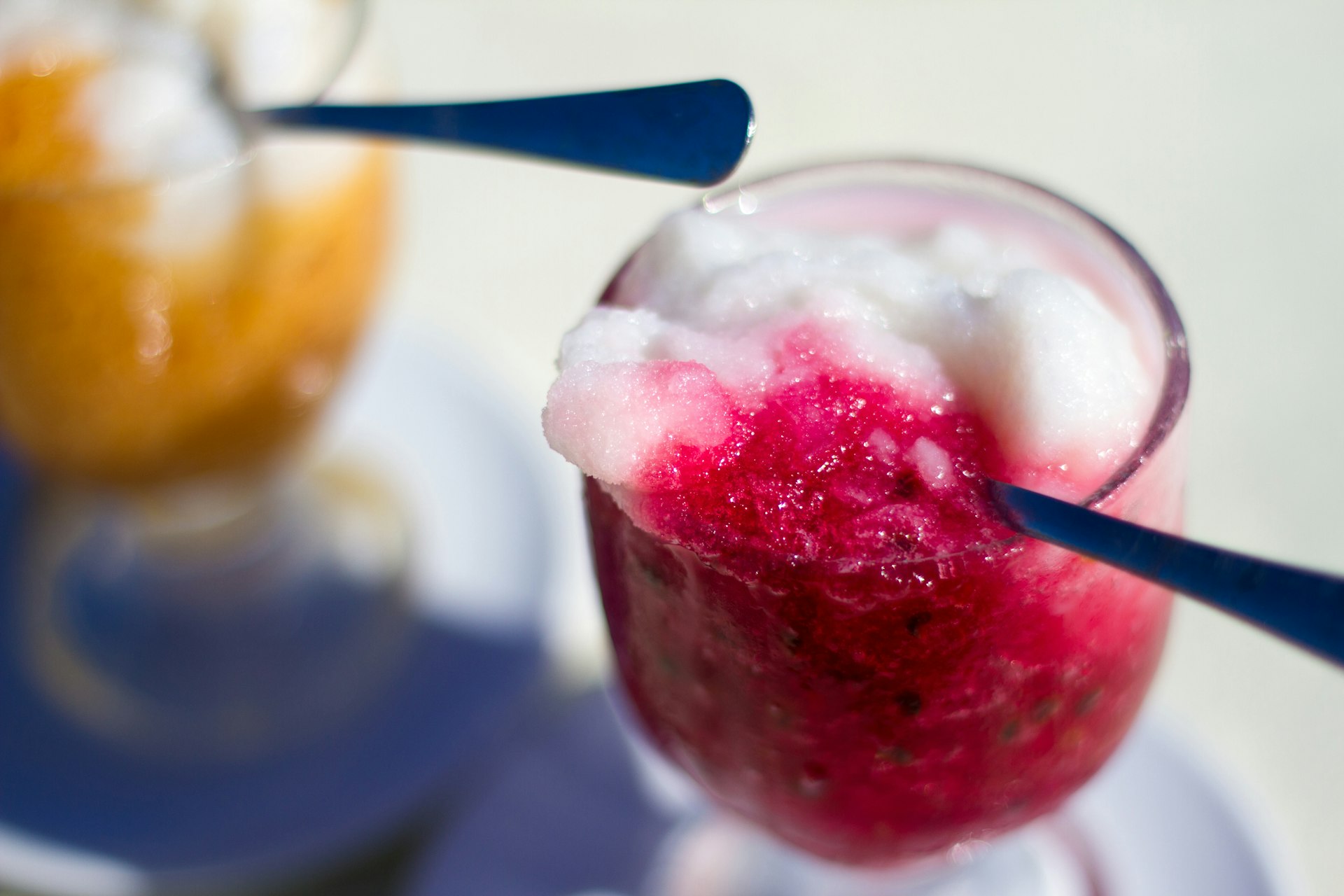 Sicilian granita made with prickly pear fruit, water, and sugar. Served in a glass, ready to be eaten. 