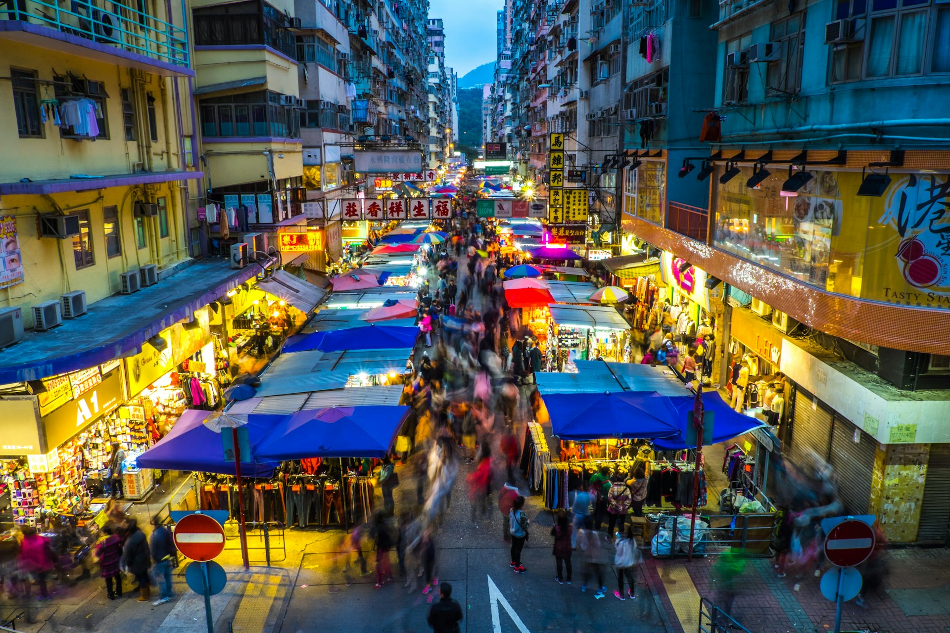 Endless crowds at a night market in Mongkok district.