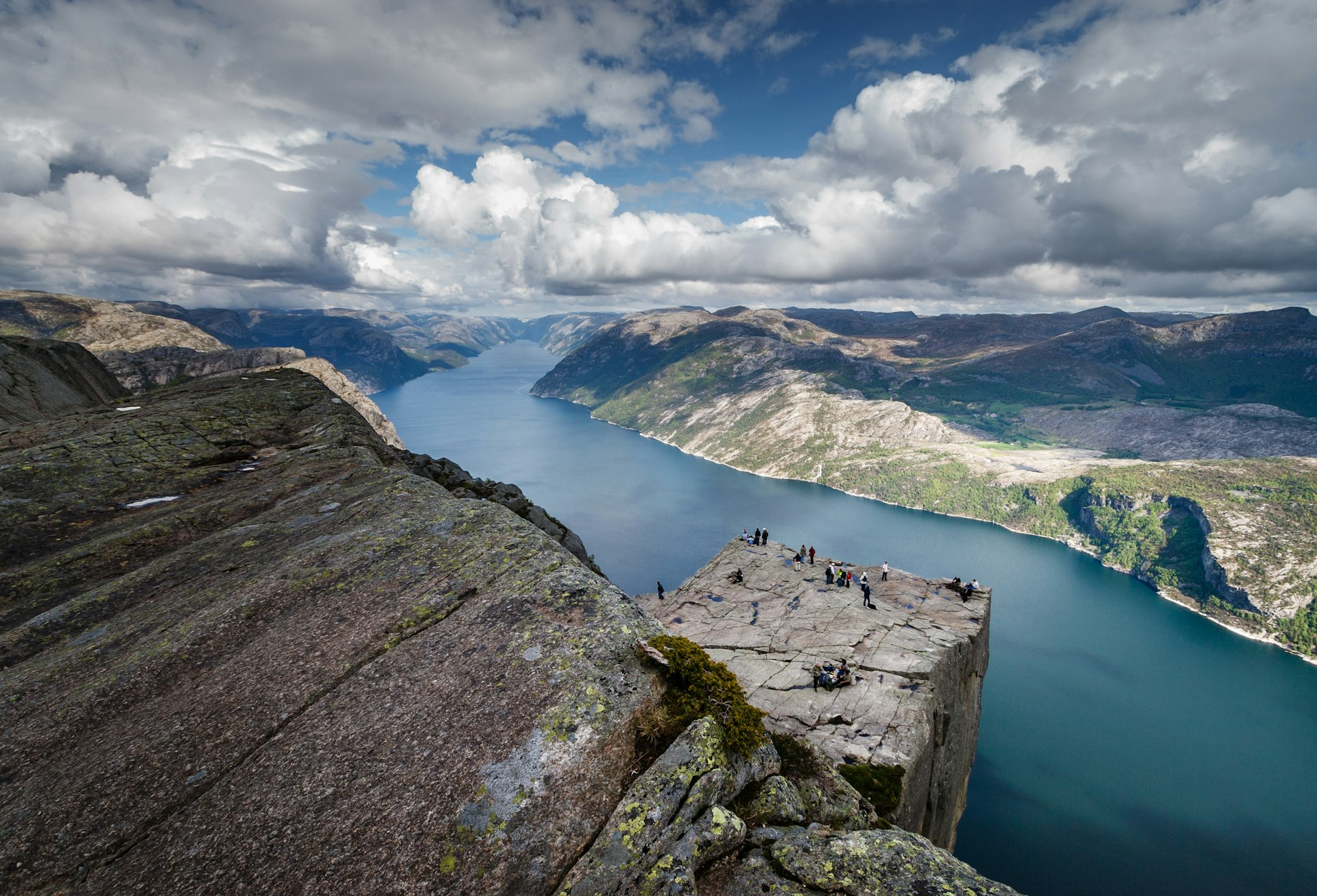 A view of a rocky outcrop in front of the fjords of Norway. 