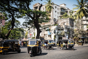 Rickshaw traffic in Bandra on a hot summer day in Mumbai.