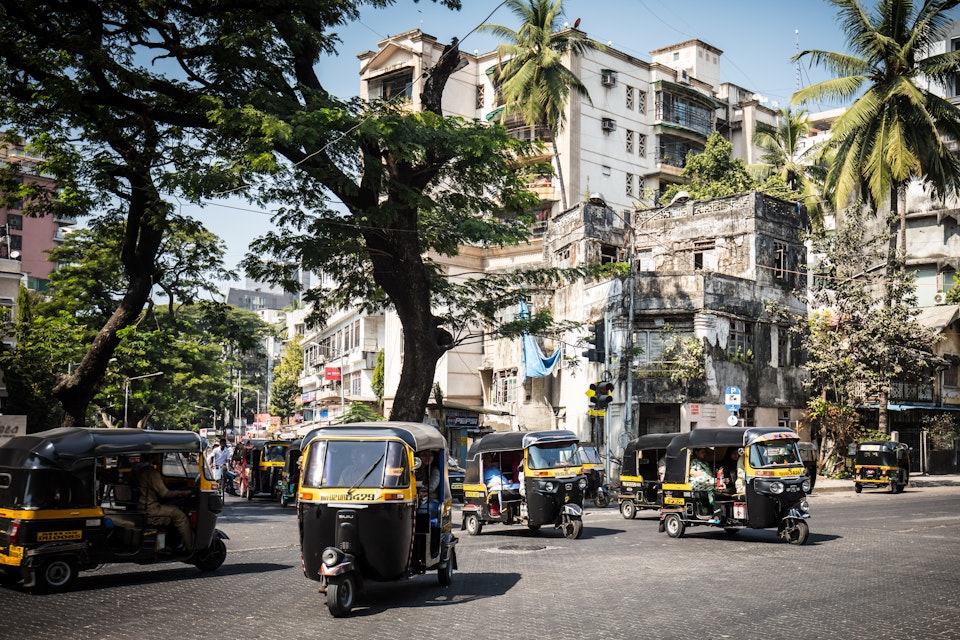 Rickshaw traffic in Bandra on a hot summer day in Mumbai.