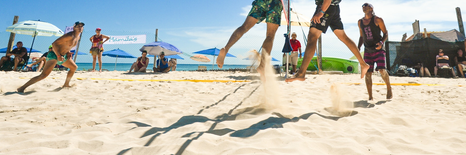 People playing beach volley in Playa Del Carmen.