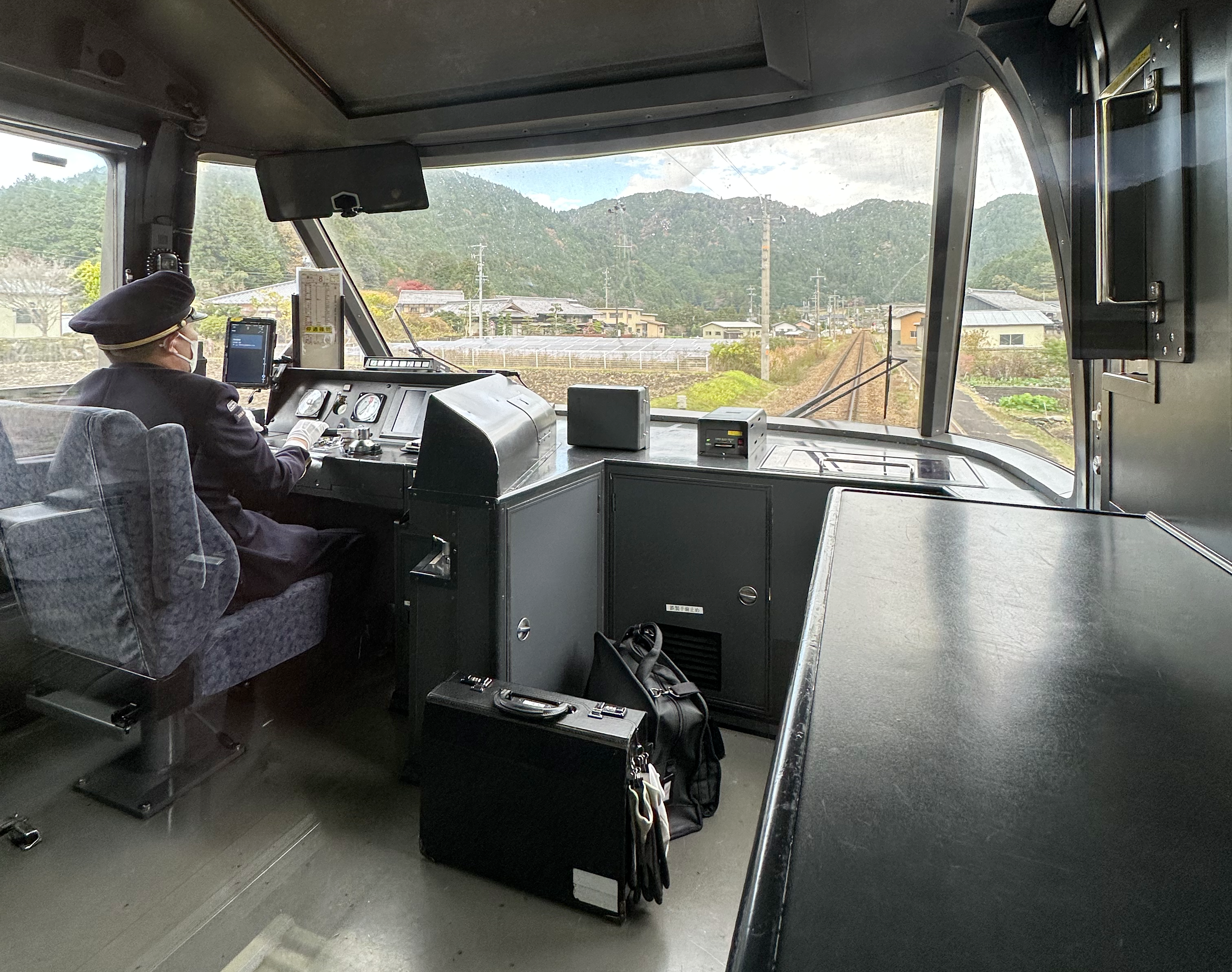 A Japan Railways driver aboard the Hida train line, Japan