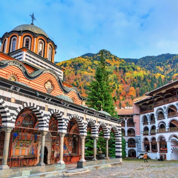 Exterior of the Orthodox Rila Monastery in the Rila Nature Park.
1160109394
ancient, architecture, attraction, autumn, beautiful, blue, building, bulgaria, church, city, clouds, courtyard, culture, destination, europe, exterior, facade, fall, famous, heritage, historic, history, journey, landmark, medieval, monastery, monument, mountains, national, national park, october, old, orthodox, park, religion, religious, rila, rila monastery, rila nature park, sky, structure, tourism, tourist, town, travel, unesco, vacation, vibrant, visit