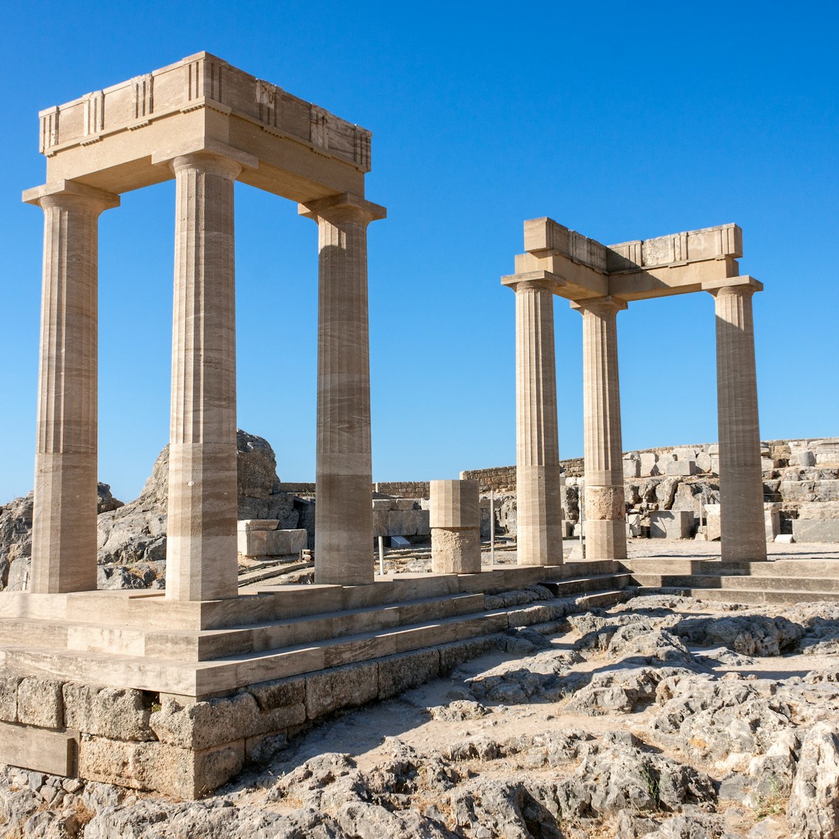 Ruins of the ancient temple on the Acropolis of Lindos.
1513583801
acropolis, acropolis of lindos, ancient, antique, archeology, architecture, classical, clouds, colonnade, column, columns, destination, dodecanese, dorian, doric, europe, excursion, fortress, greece, greek, heritage, historic, history, island, landscape, lindos, monument, old, old lindos, old rhodes, old town, rhodes, ruins, temple, temple of athena, tourism, travel