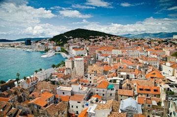 Aerial view of Split's historic Diocletian's Palace, Old Town and Marjan hill.
