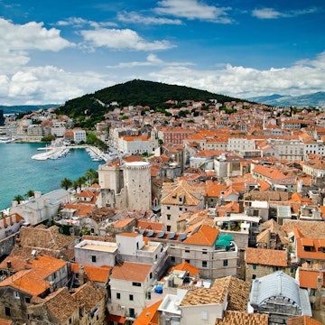 Aerial view of Split's historic Diocletian's Palace, Old Town and Marjan hill.
