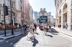 London, UK - June 26, 2018: Many people men pedestrians on bicycles riding waiting for traffic light on bikes street road in center of downtown financial district city, old architecture, sunny summer; Shutterstock ID 1128728999; your: Brian Healy; gl: 65050; netsuite: Lonely Planet Online Editorial; full: Cycling in London
1128728999