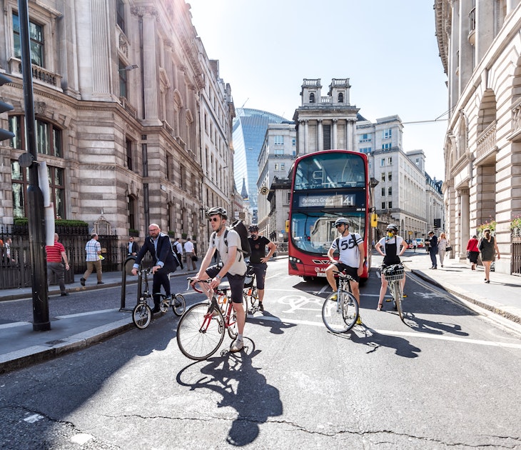 London, UK - June 26, 2018: Many people men pedestrians on bicycles riding waiting for traffic light on bikes street road in center of downtown financial district city, old architecture, sunny summer; Shutterstock ID 1128728999; your: Brian Healy; gl: 65050; netsuite: Lonely Planet Online Editorial; full: Cycling in London
1128728999