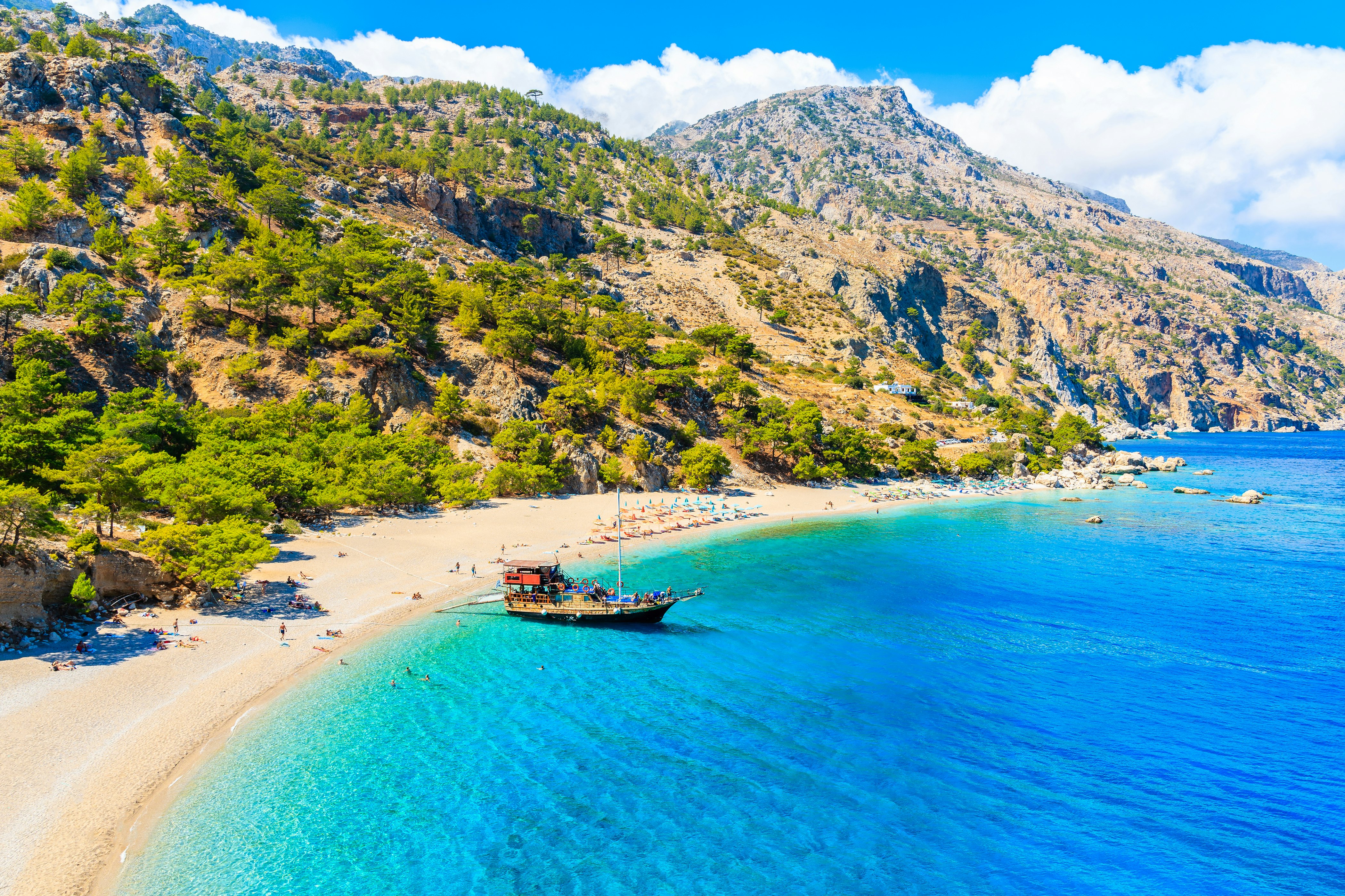 Tourist boat anchoring at beautiful Apella beach on Karpathos island, Greece; Shutterstock ID 1194560110; your: Erin Lenczycki; gl: 65050; netsuite: Digital; full: POI
1194560110