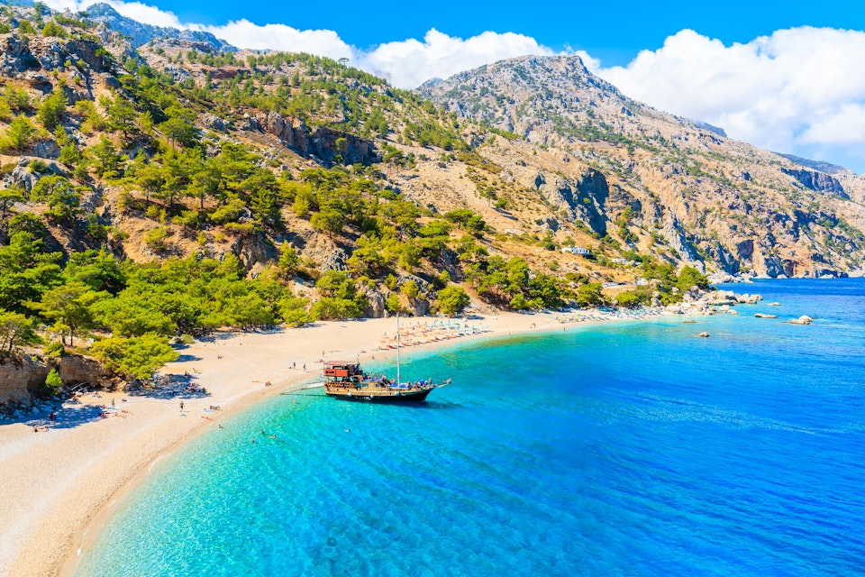Tourist boat anchoring at beautiful Apella beach on Karpathos island, Greece; Shutterstock ID 1194560110; your: Erin Lenczycki; gl: 65050; netsuite: Digital; full: POI
1194560110