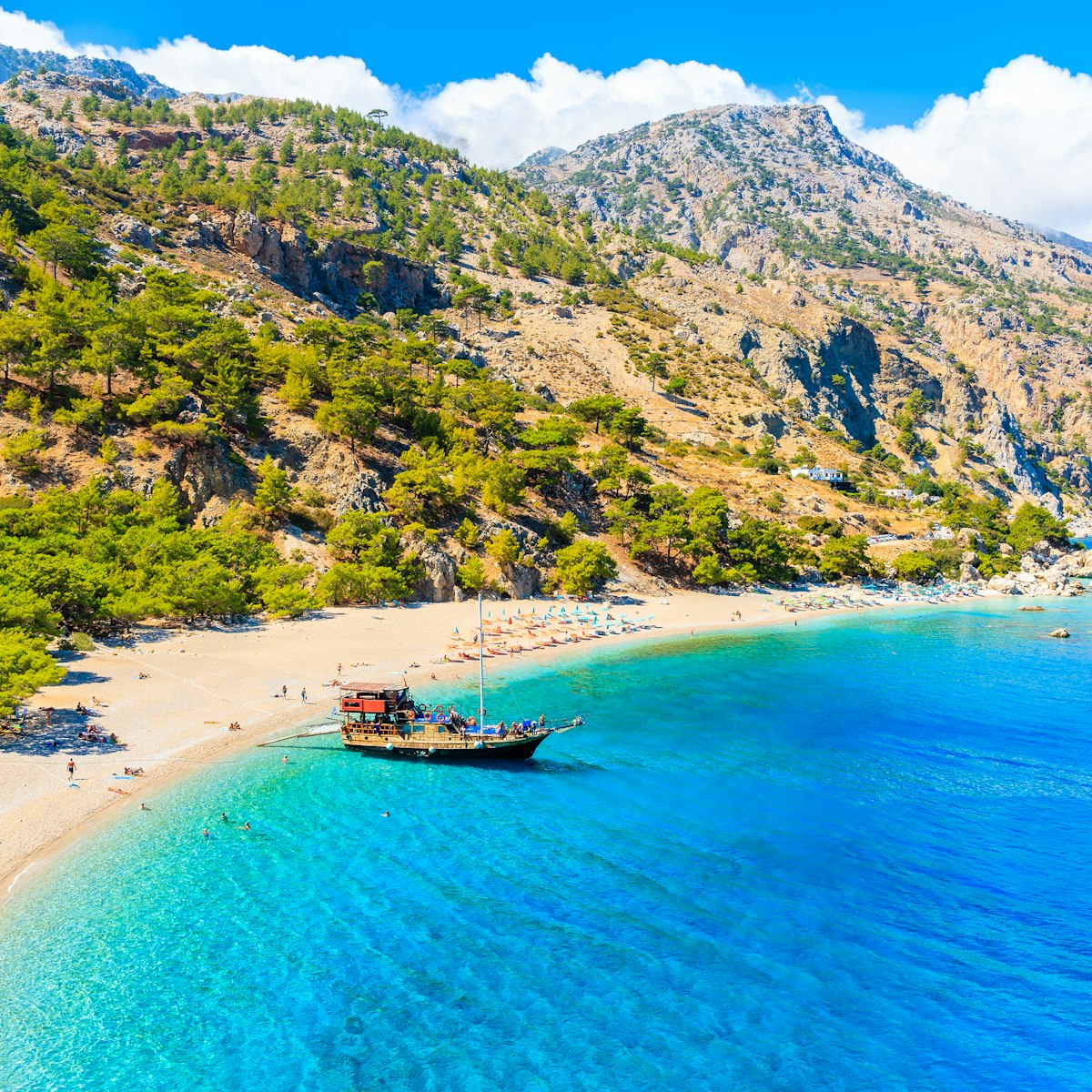 Tourist boat anchoring at beautiful Apella beach on Karpathos island, Greece; Shutterstock ID 1194560110; your: Erin Lenczycki; gl: 65050; netsuite: Digital; full: POI
1194560110