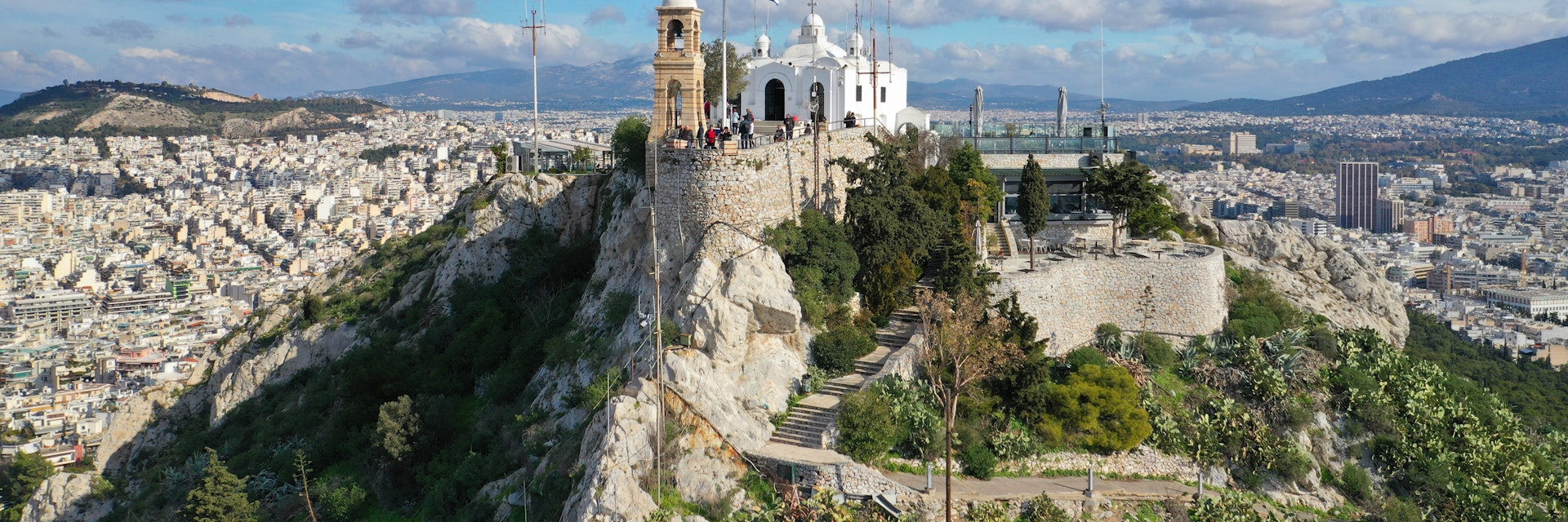 Aerial drone photo of iconic chapel of Saint George on top of Lycabettus hill with beautiful deep blue sky and clouds, Athens, Attica, Greece; Shutterstock ID 1614107947; your: Erin Lenczycki; gl: 65050; netsuite: Digital; full: POI
1614107947