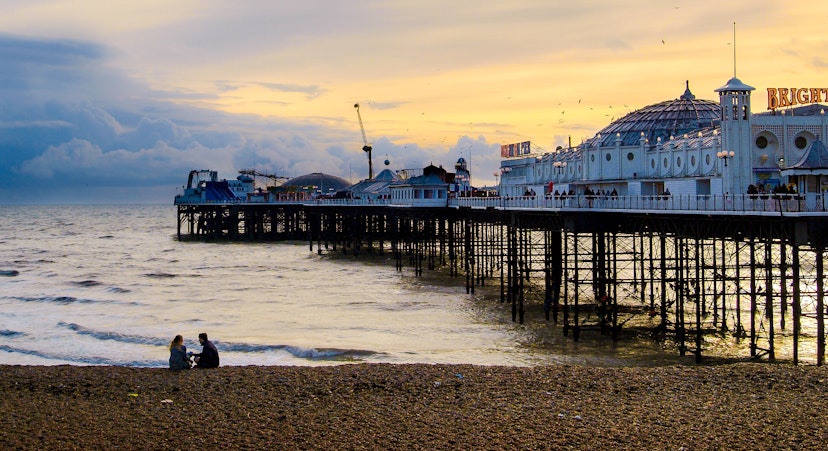 A man proposes to his fiance on the beach beside Brighton Pier, UK; Shutterstock ID 1759258061; your: Claire N; gl: 65050; netsuite: Online ed; full: london day trips
1759258061