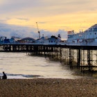 A man proposes to his fiance on the beach beside Brighton Pier, UK; Shutterstock ID 1759258061; your: Claire N; gl: 65050; netsuite: Online ed; full: london day trips
1759258061