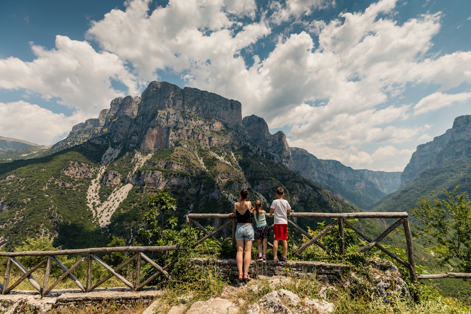 Family admiring the view of Vikos Gorge.