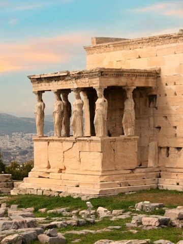 Erechtheion Temple (or Erechtheum) with the figures of Caryatids at the archaeological site of Acropolis in Athens, Greece at sunset. It was dedicated to both Athena and Poseidon. Golden soft light; Shutterstock ID 2144514097; your: Erin Lenczycki; gl: 65050; netsuite: Digital; full: Digital
2144514097