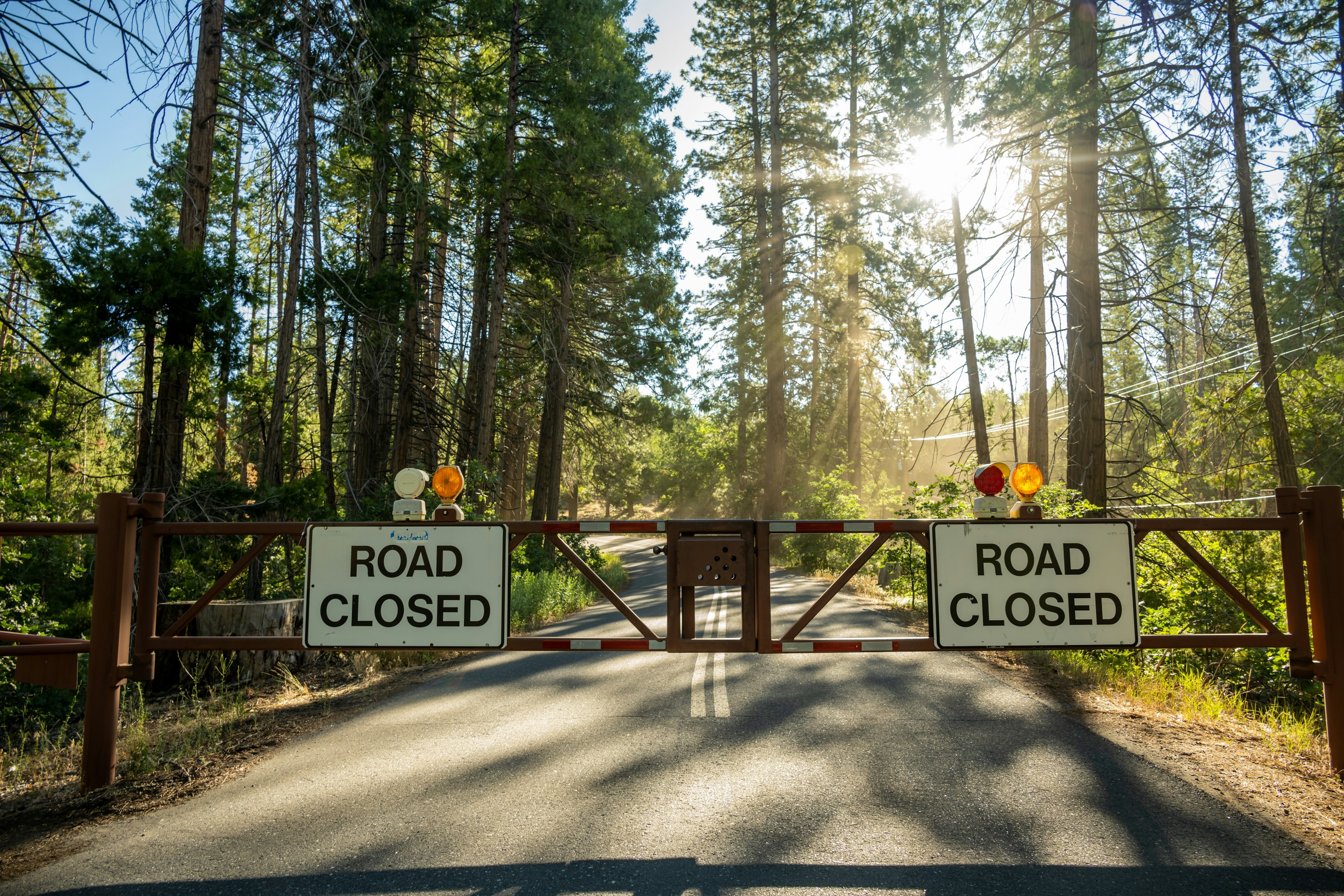 A road closure barrier across a remote road in Yosemite National Park