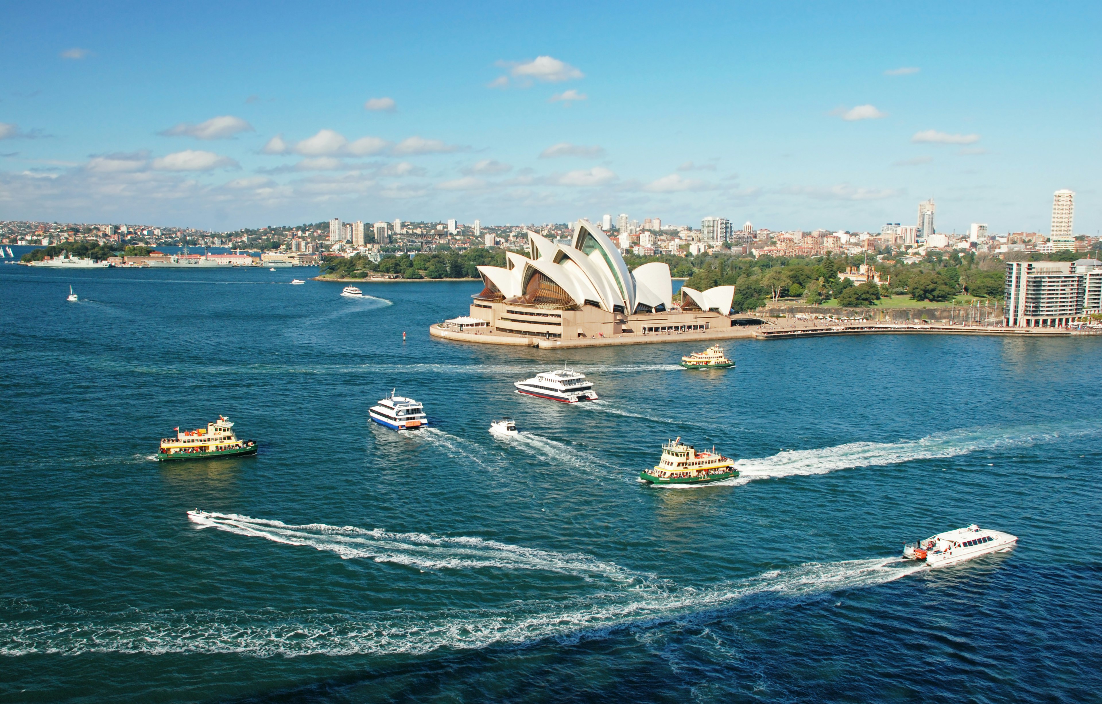 An aerial view of Sydney Opera House with ferries in front, Sydney, New South Wales, Australia