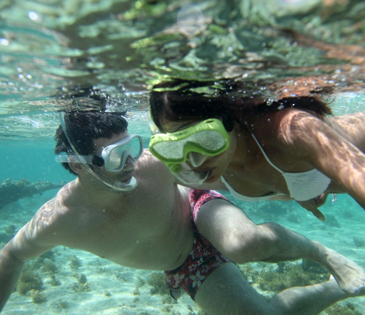 Couple snorkeling in Caribbean waters; Shutterstock ID 99681071; your: Brian Healy; gl: 65050; netsuite: Lonely Planet Online Editorial; full: Best places in Caribbean for couples
99681071