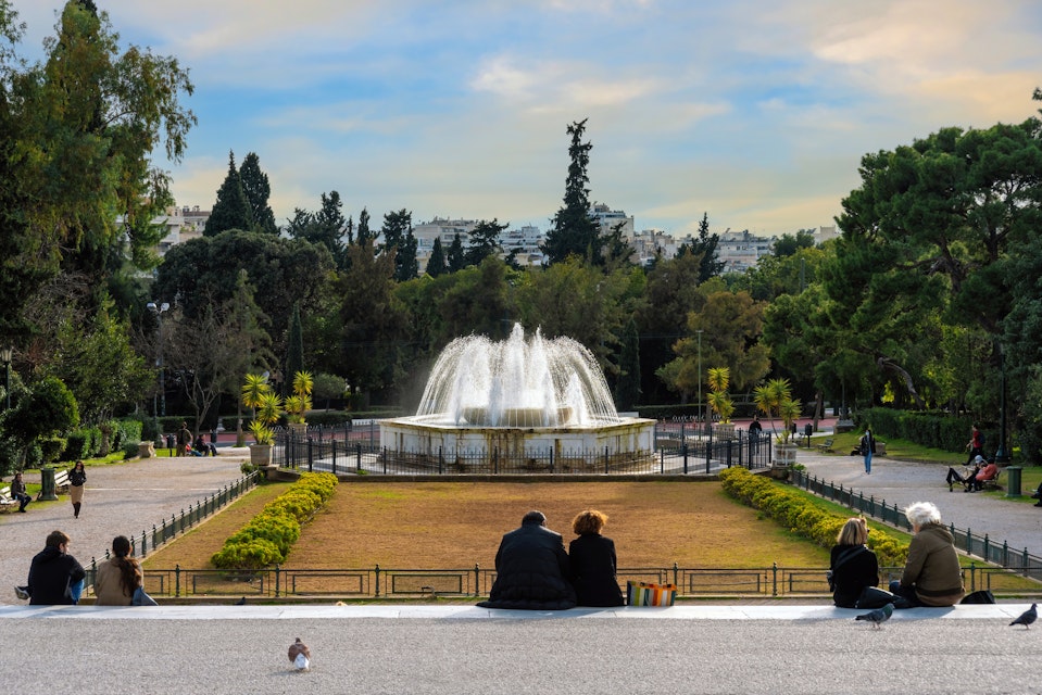 Athens, Attica, Greece - Jan 29, 2021: The marble fountain in front of the Zappeion Hall neoclassical building in the National Garden of Athens near Syntagma Square. People relaxing under the sun; Shutterstock ID 1965705790; your: Erin Lenczycki; gl: 65050; netsuite: Digital; full: POI
1965705790