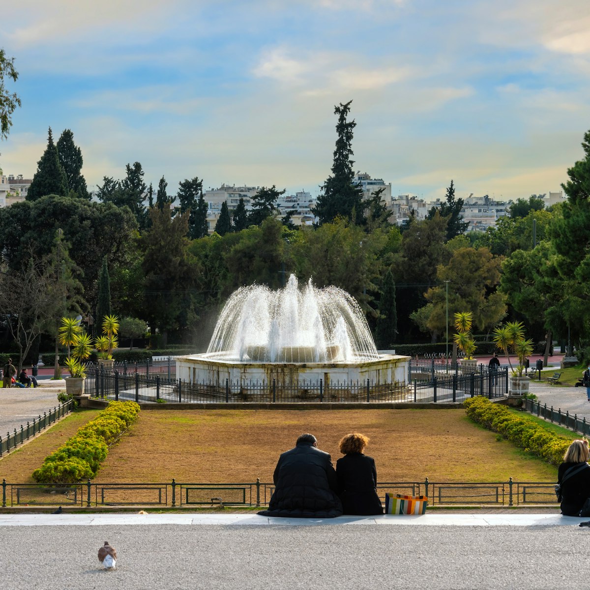 Athens, Attica, Greece - Jan 29, 2021: The marble fountain in front of the Zappeion Hall neoclassical building in the National Garden of Athens near Syntagma Square. People relaxing under the sun; Shutterstock ID 1965705790; your: Erin Lenczycki; gl: 65050; netsuite: Digital; full: POI
1965705790