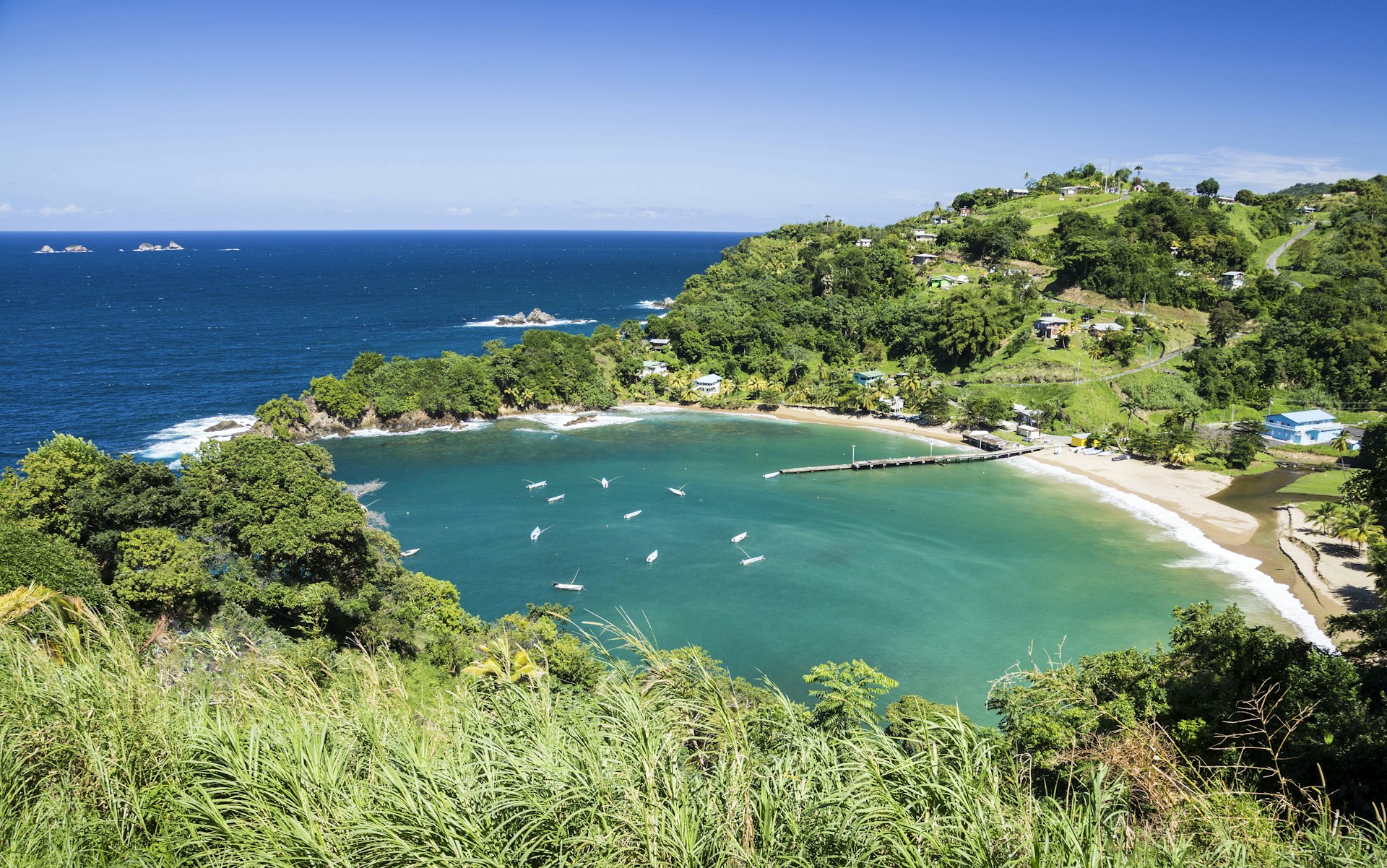 An aerial view of the blue-green waters in the inlet and beach at Parlituvier, Tobago