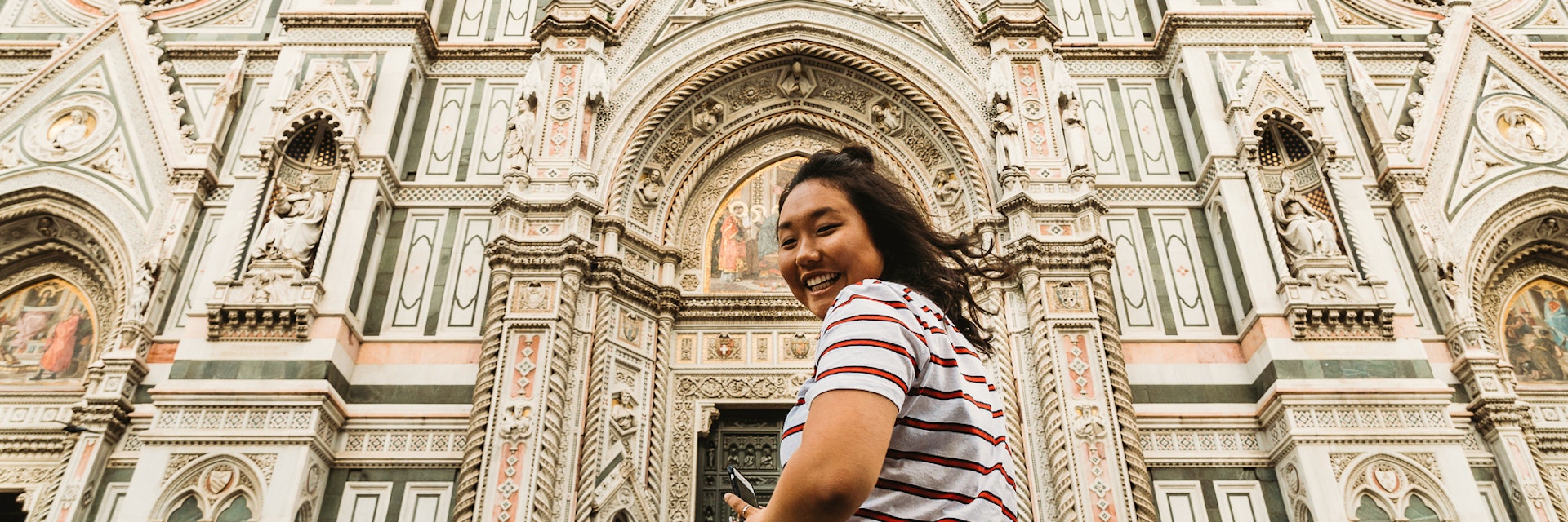 Asian tourist visiting Florence, Italy