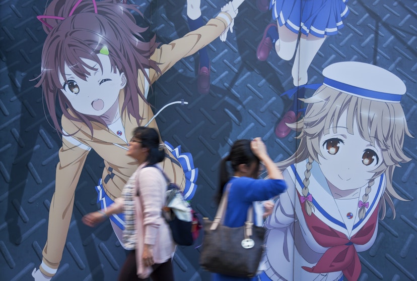 A late afternoon view shows two young women walking past a wall-sized anime mural along Chuo-dori (Central Avenue) in the Akihabara district (known as Electric Town for its maze of electronics stores, but currently considered an almost sacred destination by members of Japan's otaku culture, drawn to Akihabara's video game centers, maid cafes, anime shops, and manga comics), located in Chiyoda Ward in central Tokyo, Japan.
1006391584