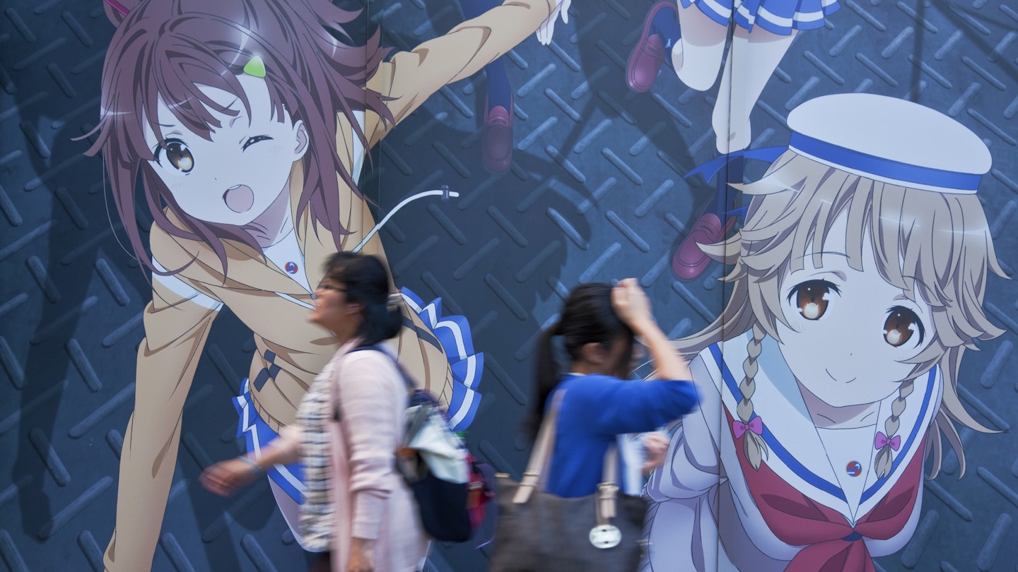 A late afternoon view shows two young women walking past a wall-sized anime mural along Chuo-dori (Central Avenue) in the Akihabara district (known as Electric Town for its maze of electronics stores, but currently considered an almost sacred destination by members of Japan's otaku culture, drawn to Akihabara's video game centers, maid cafes, anime shops, and manga comics), located in Chiyoda Ward in central Tokyo, Japan.
1006391584